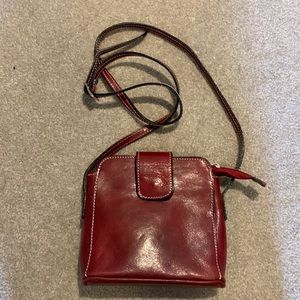 Small red leather cross body bag. Never used